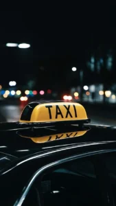 black yellow sign taxi night placed top car 926199 3943059 169x300 (1)